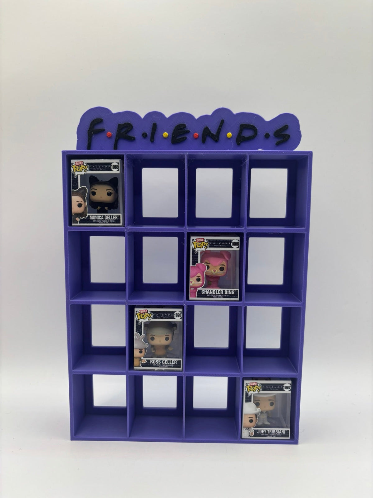 Expositor Bitty Pop Friends logo (morado) - Zascalo.com