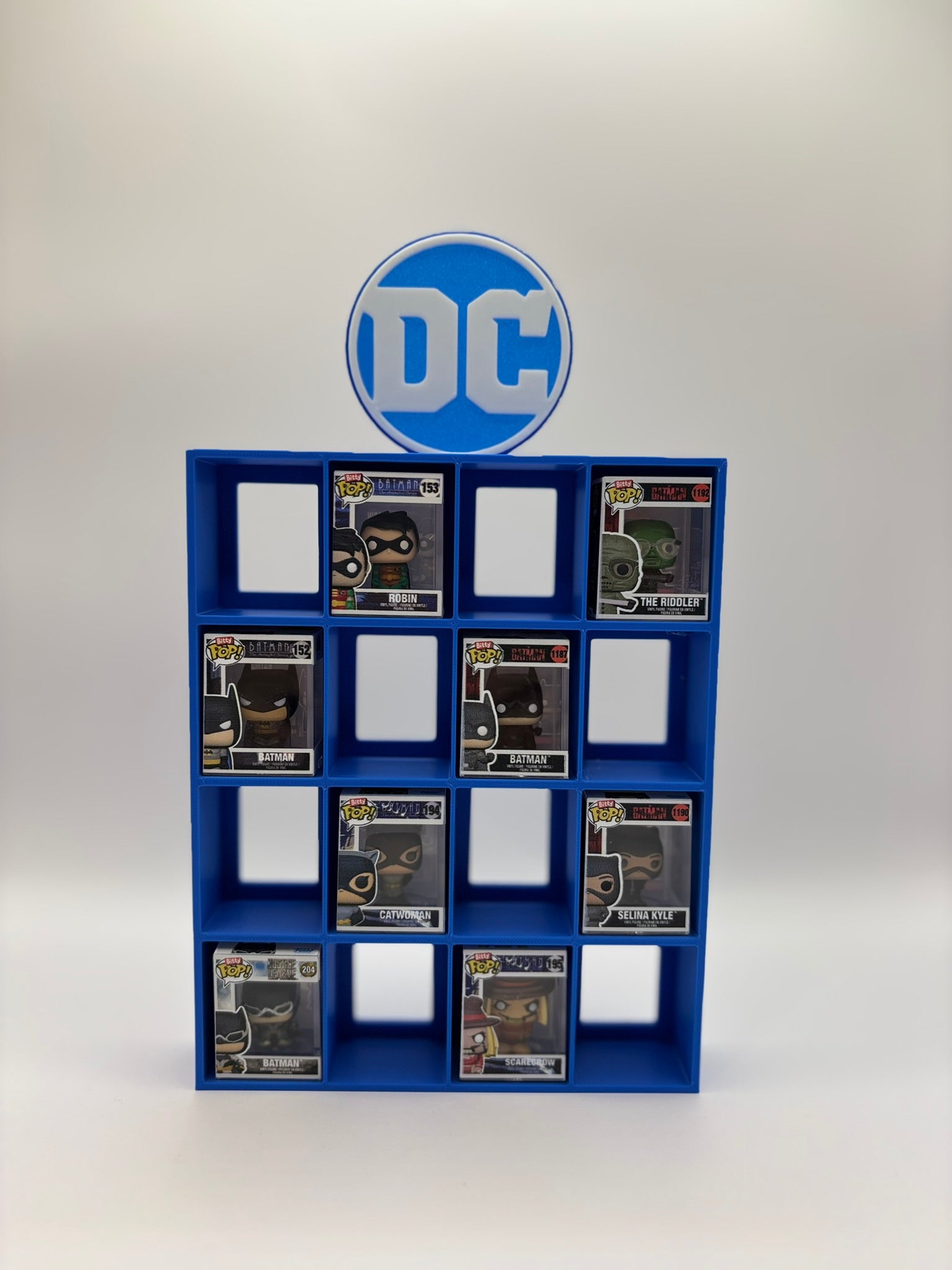 Estantería / Display Bitty Pop – Logo DC Comics para 16 figuras