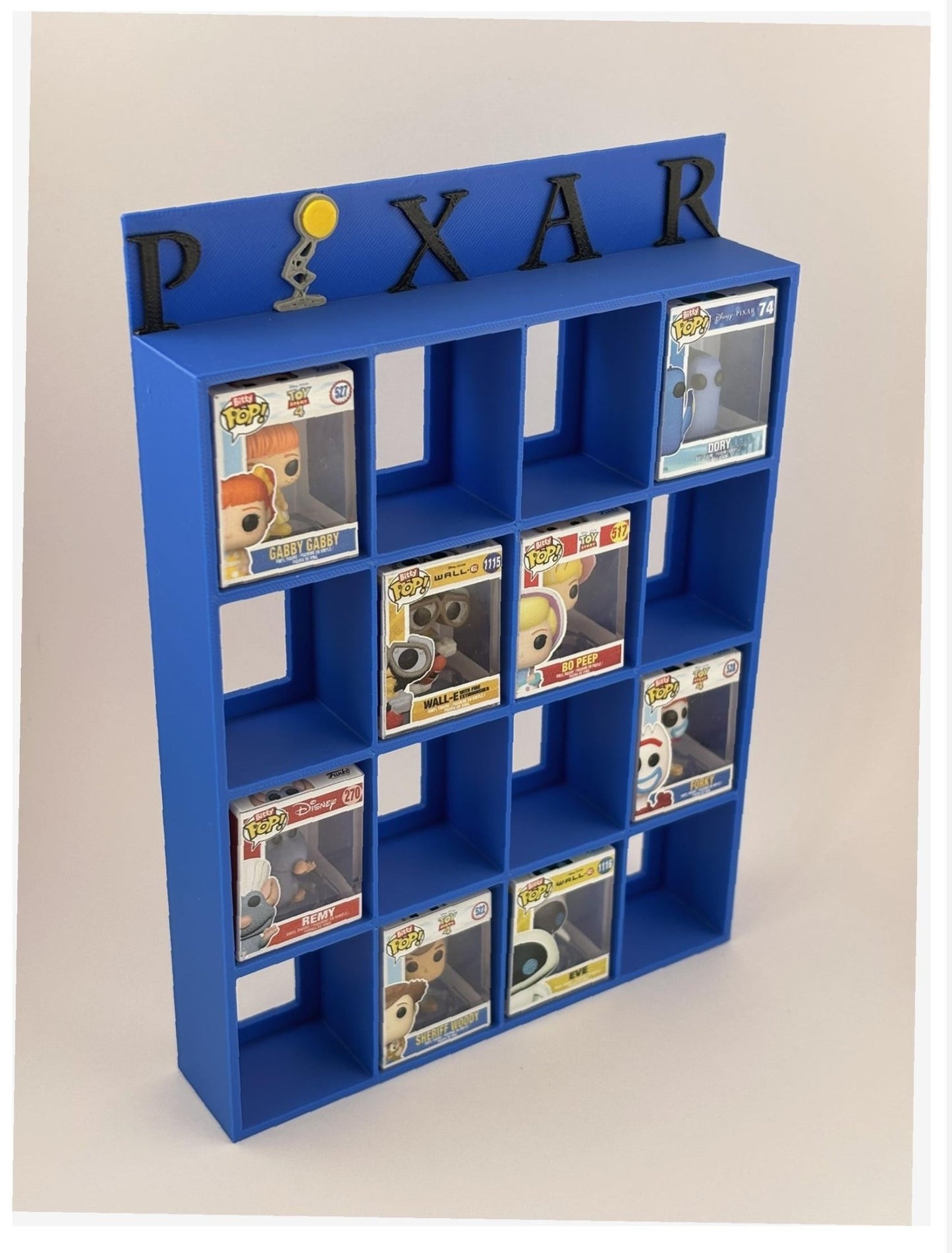 Estantería / Display Bitty Pop – Diseño Pixar con Lámpara Luxo para 16 figuras - Zascalo.com