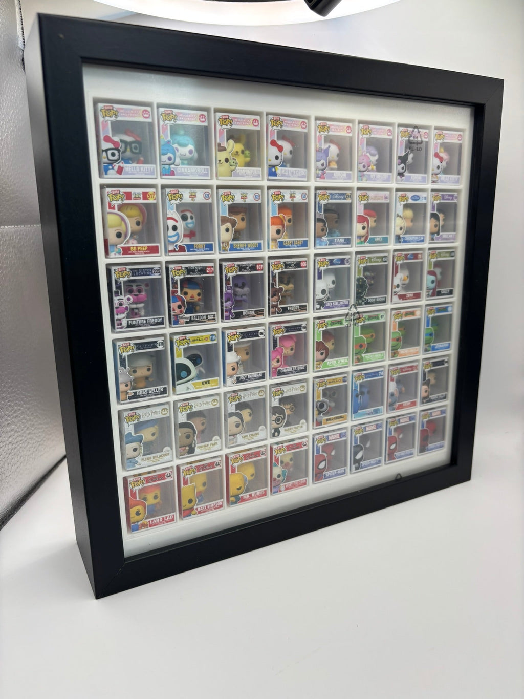 Expositor Bitty Pop con marco interno para cuadro Ikea Sannahed 25x25 (blanco) - Zascalo.com