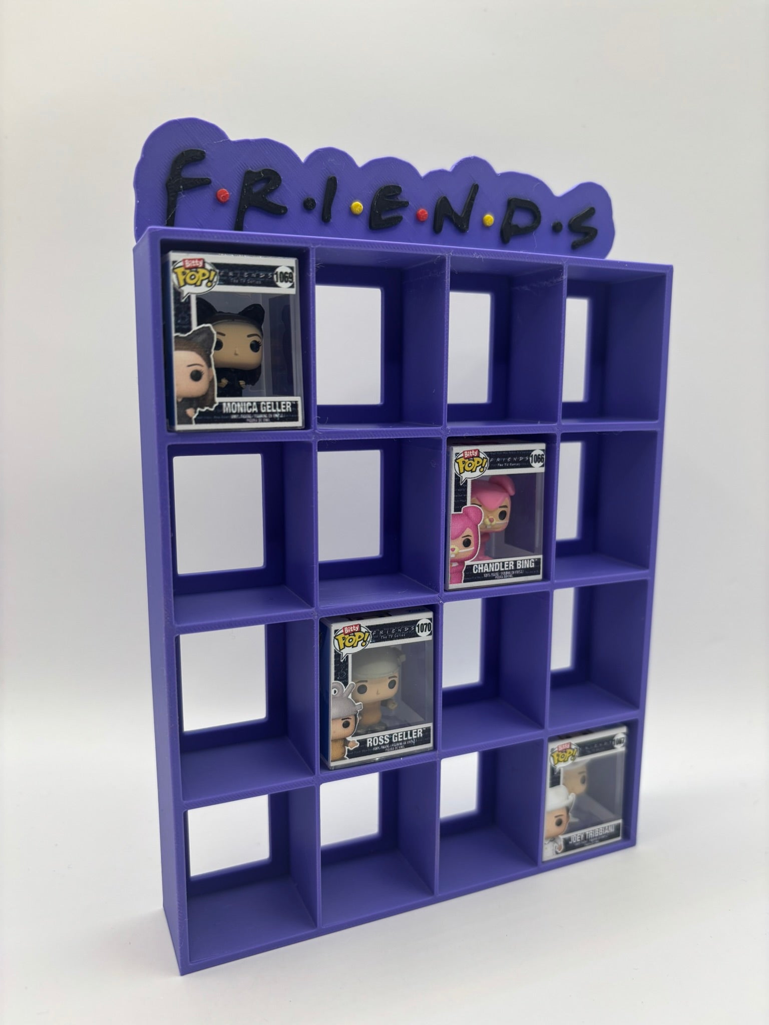 Expositor Bitty Pop Friends logo (morado) - Zascalo.com
